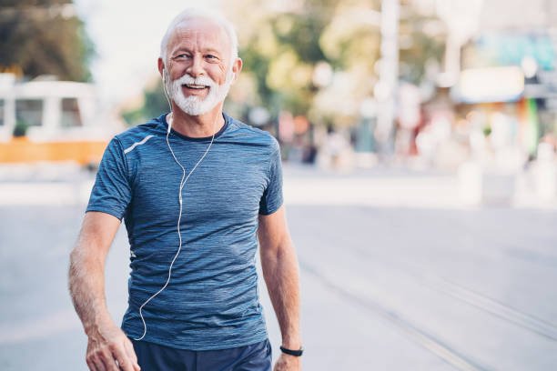 Man walking outdoors at sunset